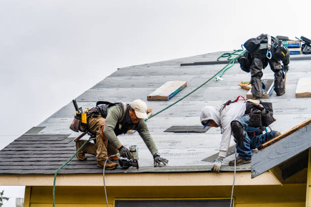 Professional Gutter Installation technician working in Packwood, WA